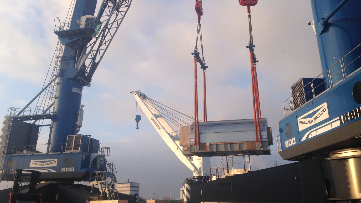 Heavy cargo is loaded with a crane in Hamburg
